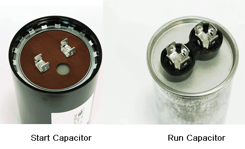 A top view of an AC start capacitor and run capacitor