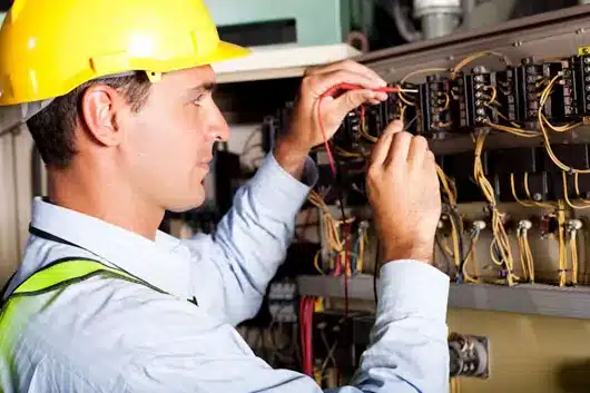 An engineer inspecting the AC fuse issues