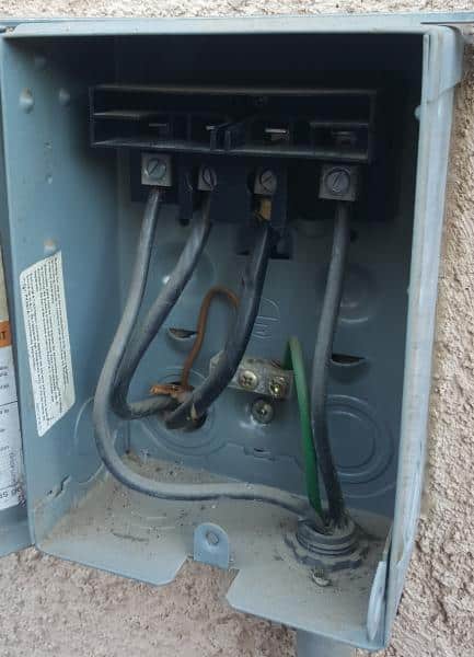 An inner view of an AC fuse box outside