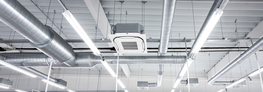 A view of a ceiling ac system inside an industrial place