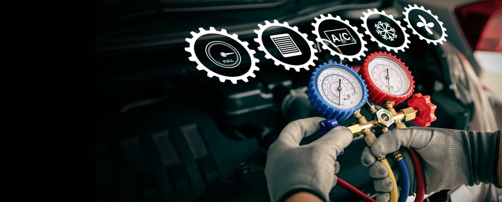 A view of a mechanic checking the car ac compressor