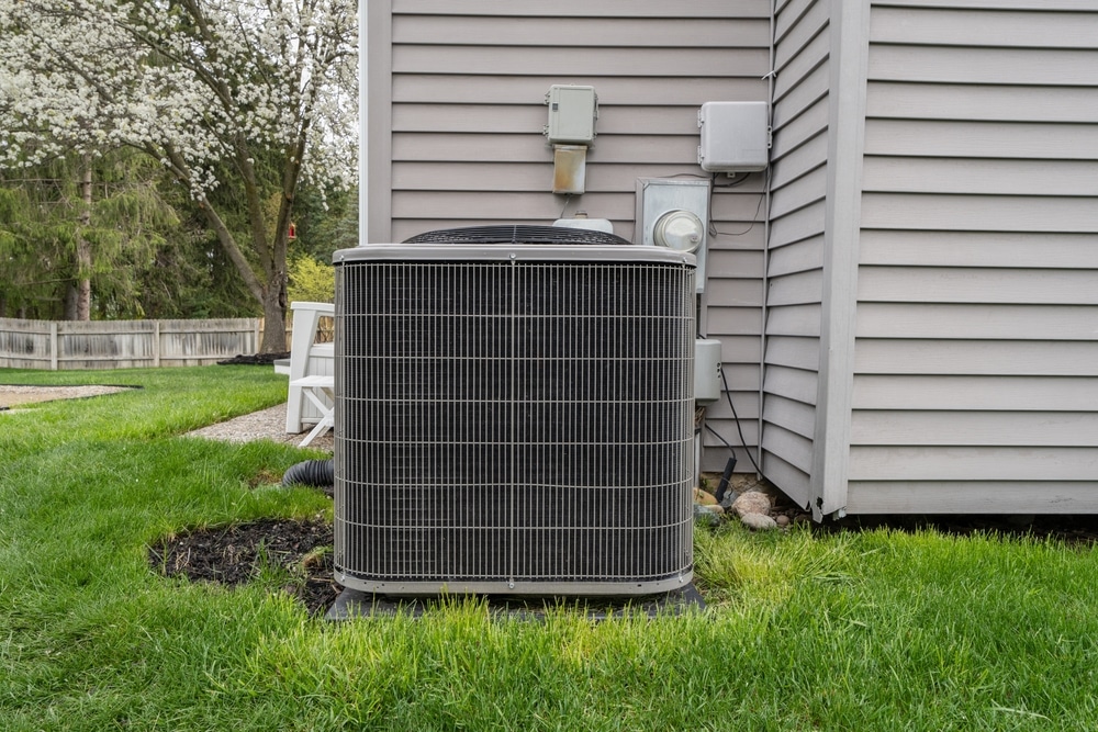 A view of an ac condenser unit outdoors